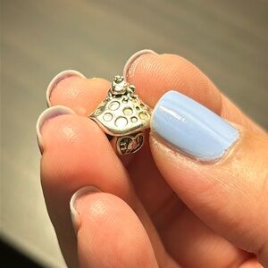 Retired pandora frog on a mushroom charm